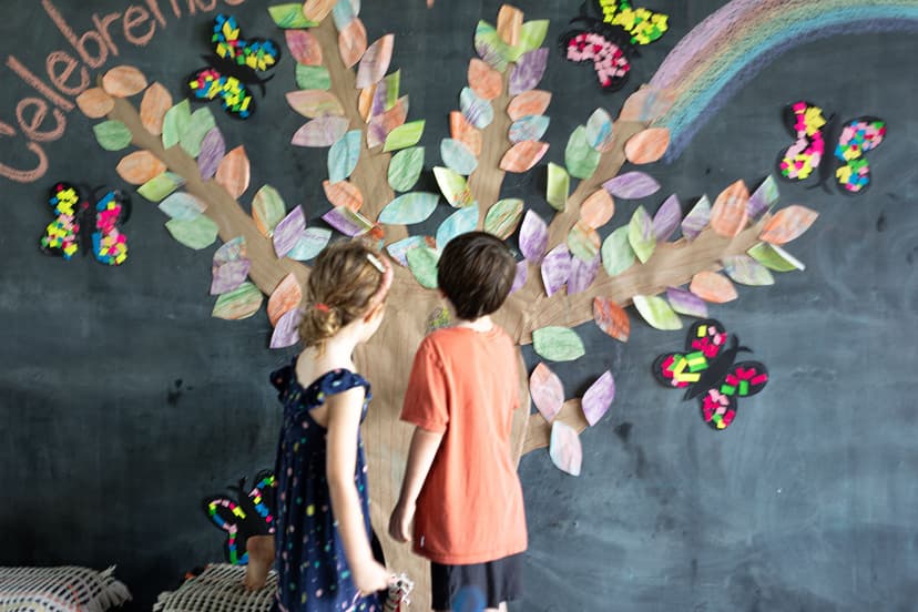 Students gathered around a tree