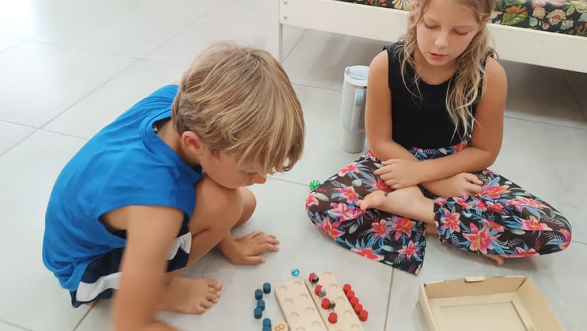 Students playing a board game together