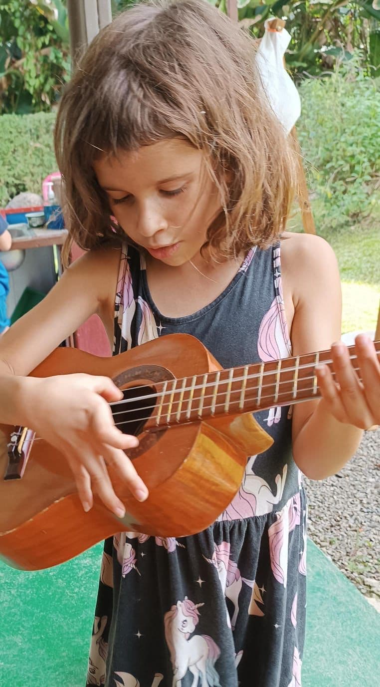 Girl playing ukulele